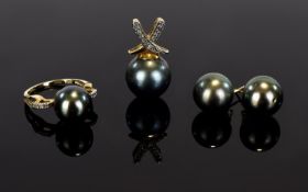 A 9ct Gold And Black Tahitian Pearl Jewellery Suite Three items in total comprising unusual ring,