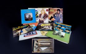 A Collection Of Records From Various Decades including " Chas "N" Daves Knees Up",