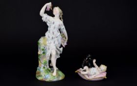 Sitzendorf - Small Hand Painted Porcelain Figure Group of a Young Baby and Small Dog.