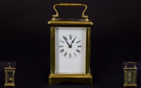 English Late 19th Century Brass Carriage Clock with Visable Escapement Glass Panels.