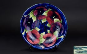 W. Moorcroft Signed Shallow Bowl ' Pansy ' Design on Blue Ground.