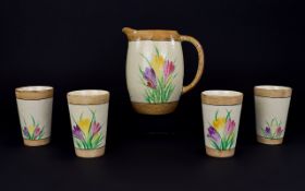 Royal Ivory John Maddock & Sons "Sunset Ware" Lemonade Jug and Four beakers. 7 inches in height.