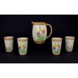 Royal Ivory John Maddock & Sons "Sunset Ware" Lemonade Jug and Four beakers. 7 inches in height.