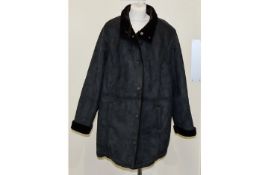 Ladies Coat. Marks and Spencer size 22 sheepskin coat with fur lined cuffs with 2 front pockets