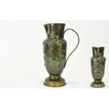 Trench Art Jug An antique brass jug fashioned from shell casing with footed bottom and attractive
