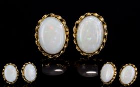 A Nice Pair of 9ct Gold Opal Set Earrings.