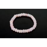 Natural Pink Opal Rondelle Bracelet, pink opal, mined in Peru, totalling approximately 75cts, carved