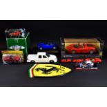 A Collection Of Ferrari Memorabilia And Collectable Cars to include a boxed Hot wheels Ferrari and