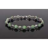 9ct White Gold Tsavorite Garnet and Tanzanite Flower Design Cluster Bracelet. Marked 9ct Gold.