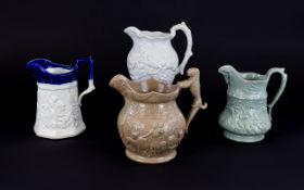 Four Various Figural Character Moulded Jugs, one, pale green, showing Robinson Crusoe,