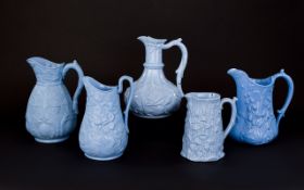 Five Various 19thC Foliage Themed Blue Moulded Jugs comprising one T.