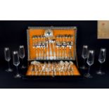 Boxed Canteen of Cutlery Together with an Italian Boxed set of six champagne flutes