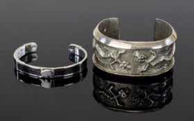 Silver African Elephant Design Cuff And Silver Tone Statement Cuff Two items in total, the first a