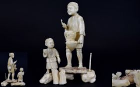 Japanese - Signed Meiji Period Well Carved Ivory Figure Group of a Father and Son Fishing on The