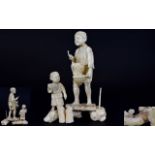 Japanese - Signed Meiji Period Well Carved Ivory Figure Group of a Father and Son Fishing on The