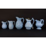 Collection of 19th Century Blue Moulded Wine Related Jugs, one, pewter lidded,