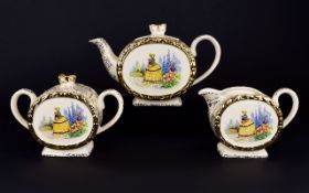 Sadler Three Piece Teaset comprising teapot, water jug and milk jug.