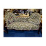 A Large Love Seat Two seater chaise/day bed with carved apron and leg detail, scroll feet and