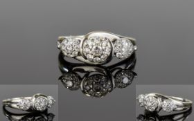 9ct White Gold Diamond Set Cluster Ring In The Form of 3 Flower Heads.