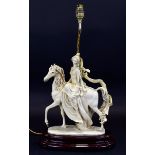 Capodimonte Lamp In the form of a maiden riding a horse, raised on a varnished wood base. Stamped '