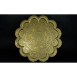A Decorative Anglo Indian Brass Charger Large circular wall decoration with scalloped edges and