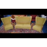 A Mid Century Scandinavian Style Three Piece Suite Comprises wing back generous two seater sofa and