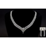 White Crystal Delicate V Shaped Necklace and Matching Long Drop Earrings,