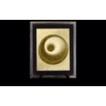 A Framed 1960's Decorative Gold Tone Picture Abstract image in gold foil with spherical detail.