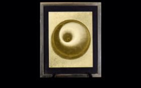 A Framed 1960's Decorative Gold Tone Picture Abstract image in gold foil with spherical detail.