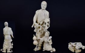 Japanese - Early 20th Century Signed and Well Carved Okimono Ivory Figure of Father and Young Child.