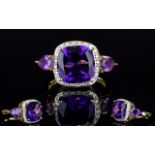 Amethyst Three Stone Ring with white topaz accents,