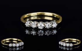 18ct Gold and Platinum Set 5 Stone Diamond Ring. Marked 18ct Gold and Platinum. c.