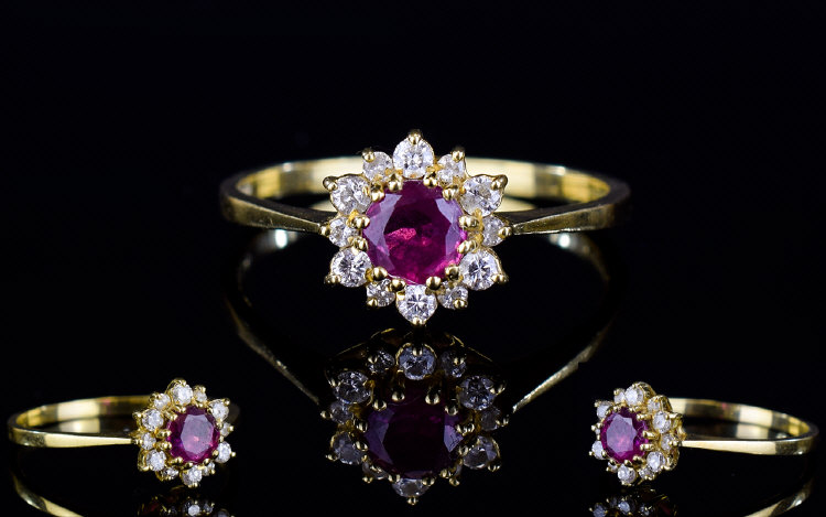 18ct Gold Dress Ring, Set With A Central Ruby Surrounded By Small Round Cut Diamonds, Fully