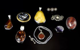A Collection Of Vintage Silver And Metal Costume Jewellery Nine items in total to include two