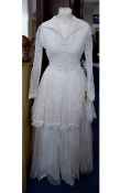 Vintage Wedding Dress An ivory wedding dress in the romantic revival style.