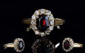 9ct Gold Set Diamond and Ruby Cluster Ring.