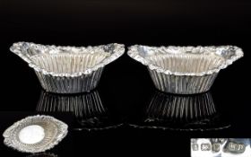 Pair of Silver Salts. Oval Silver Salts with Fancy Edge and Ribbed Bowl. Size 294mm x 261mm x 241mm.