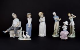 Seven Various Nao by Lladro Figures comprises young girl with doll, swan figure group, two lady