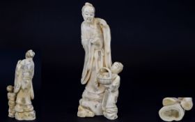 Japanese Meiji Period 1864 - 1912 Finely Carved Ivory Okimono Figure Group of an Immortal and His