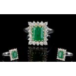 18ct White Gold Emerald and Diamond Set Cluster Ring of Nice Quality.