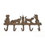 A Cast Iron 5 x Hook Key Holder In The Form of 5 Dogs. 13.3/4 x 6.5 Inches.