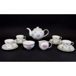 Pretty Floral Tea Set, comprising teapot, 4 cups, 4 saucers & 4 side plates together with a milk jug