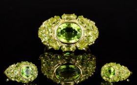 Peridot East/West Cluster Ring, to the c