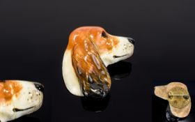 A Royal Doulton Ceramic Brooch In The Fo