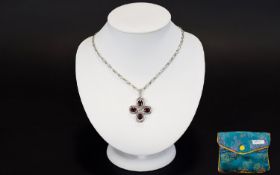 A Silver Ruby And Diamond Pendant Neckla