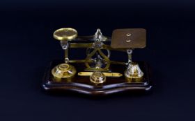 Antique Period Brass Postal Scales on Mahogany Stepped and Shaped Base / Stand.