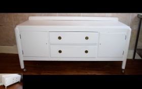 White Painted Wood Sideboard with two long drawers to centre and cupboard space to either side.