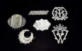 A Collection Of Antique Silver Brooches Six items in total to include two reticulated initial