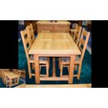 A Solid Oak Dining Suite Contemporary dining suite comprising extending table and four chairs of