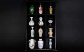 The Treasures of The Imperial Dynasties Miniature Vase Collection - Compromising of twelve